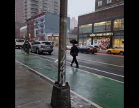 Collab WINY - Guy on suit balancing bag on head 