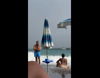 Collab IITW - Woman blue bikini sits on the beach