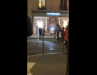 Woman shiny top dance video on street