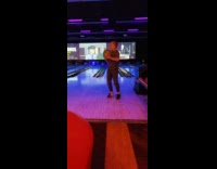 Kid throws bowling ball into other lane