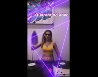 Woman plays DJ set with clothes iron
