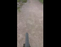 Biker rides down ramp and falls off road