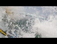 Guy on windsurf jumps over wave falls fail 