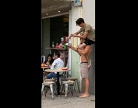 Guys make tower for food photo