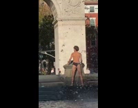 Guy black underwear shakes butt water fountain