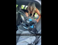 Collab BitchMP - Woman removing car seat from car 