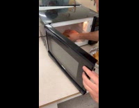 Collab Clips MPUGC - Man heats food in microwave without plate 
