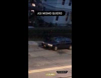 Couple argue on street woman sit on car