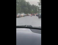 Man drive jet ski with wheels street