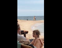 Couple romantic dance video at the beach