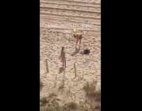 Colorful striped dress girl beach sand grass