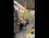 Man draw portrait of other train passengers