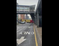 Big rig truck gets stuck making sharp turn