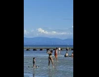 Mother takes selfies ignore son beach bridge