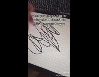 Guy draws scribbles on ipad