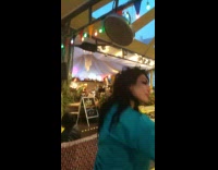 Blue tracksuit lady dances to live band 