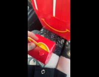 Woman orders happy meal with happy meal toy box