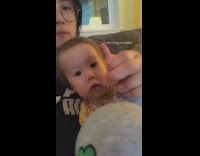 Baby rolls his eyes at mom