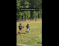 Uncle watches boy plays baseball badly