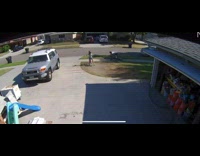 White shirt kid falls off bicycle driveway 