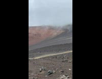 Collab IITW - Woman in pink dress dances at the sliding sands trail