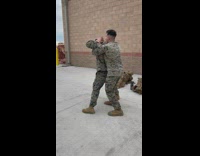 Soldier prank another soldier hump on back