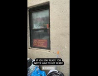 Three knives wedged in window red sign