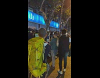 Protestor in china gets taken away by police officers