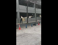 Collab IITW - A guy posing in front of parking structure 