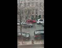 Person drives blocked parked car onto sidewalk to leave