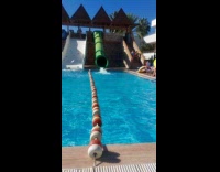 Man hits kid inside the water slide