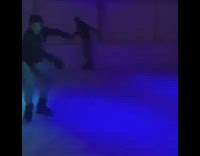 Guy skates in ice rink, slips and falls on his butt 