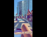 Woman yellow bikini photo shoot public pool