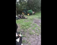 Guy crashes black motorcycle wood pallet ramp