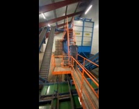 Man slides down on the stairs rail