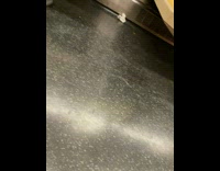 Guy in subway on blue motorcycle