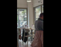 Collab Clips mpugc - Person in cafe performing magic tricks at table
