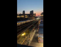 Submitter films train passed by rooftop view