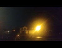 Lightning sparks across the stormy night sky 