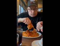 Filmer steals meatball from dad 