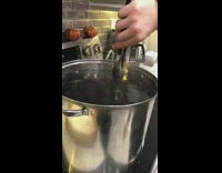 Guy boiling shoe in pot big feet joke 