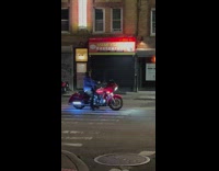 Person riding red motorcycle singing firework katy perry 