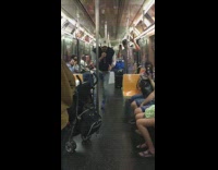 Collab Subway Creatures - Man blue vest jacket ny hat walks around subway train and sings loudly on karaoke speakers disco lights