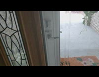 Bird nest built at front door wreath 