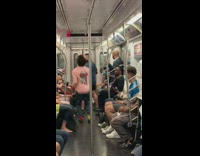 Guy in pink does flip on train bars 