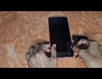 Man removes new phone screen ASMR video