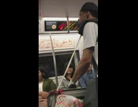 Lady riding subway starts singing with street performer  