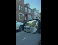 Biker pulls shopping cart 