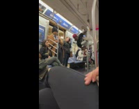 Guy dance at the pole inside train subway NYC 