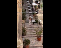 Collab IITW - Woman crop top poses by the stairs